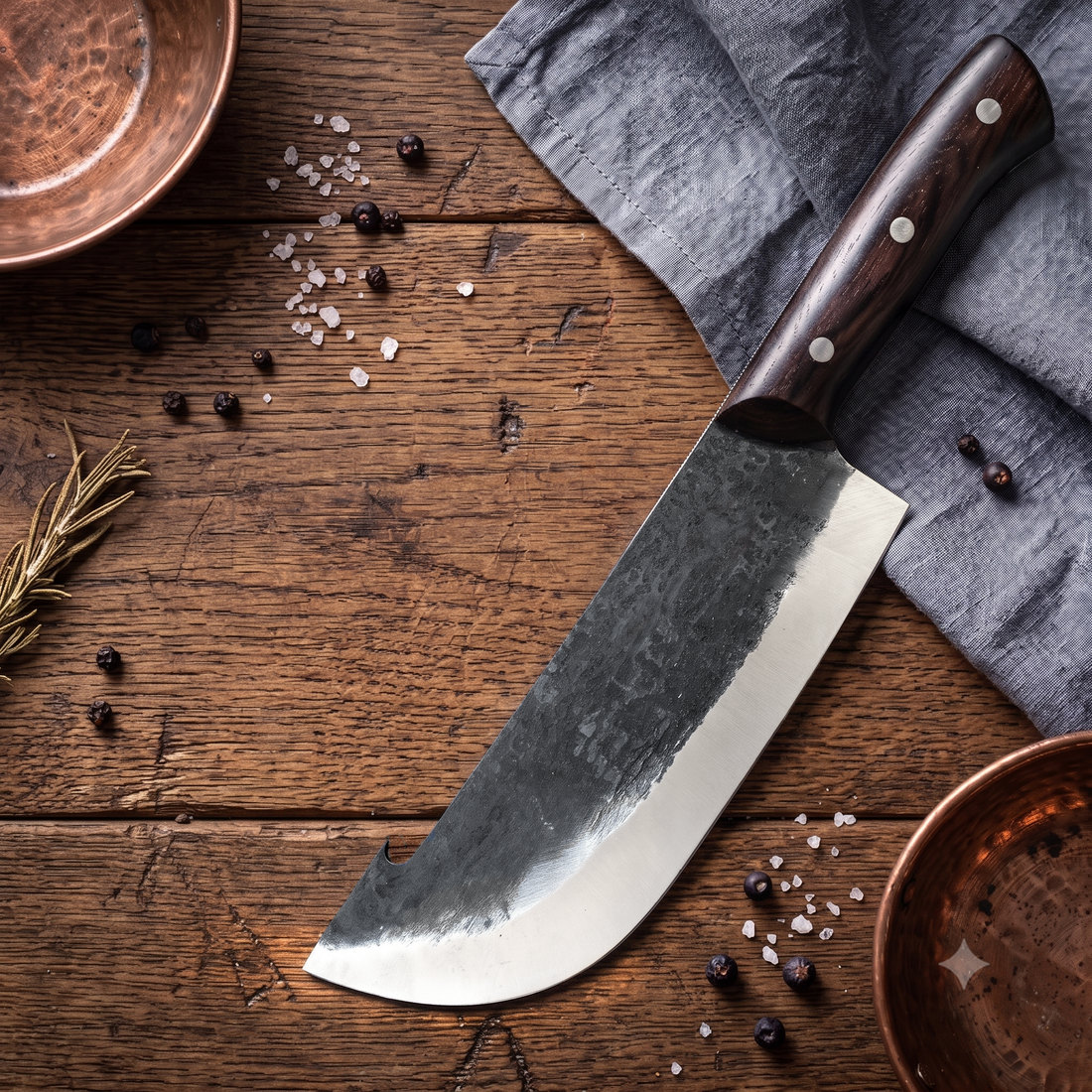 Kraken cleaver knife with hammer marked flats and polished edge, side view