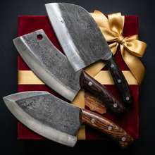 Butcher's Trio 3 piece hand forged cleaver set laid out as a gift for a cook