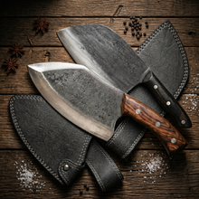 Butcher's Trio hand forged cleavers pictured with leather sheaths, hammer textured steel